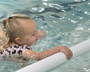 young child in orange county swimming lesson
