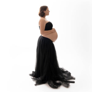 pregnant  woman in black skirt and top