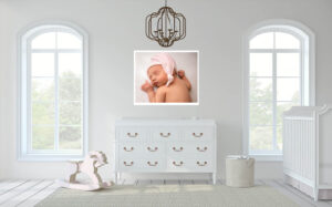 A child's nursery in the Bay Area is decorated with a white crib and a white rocking horse.