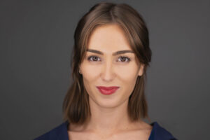 A headshot of a woman with brown hair in the Bay Area.